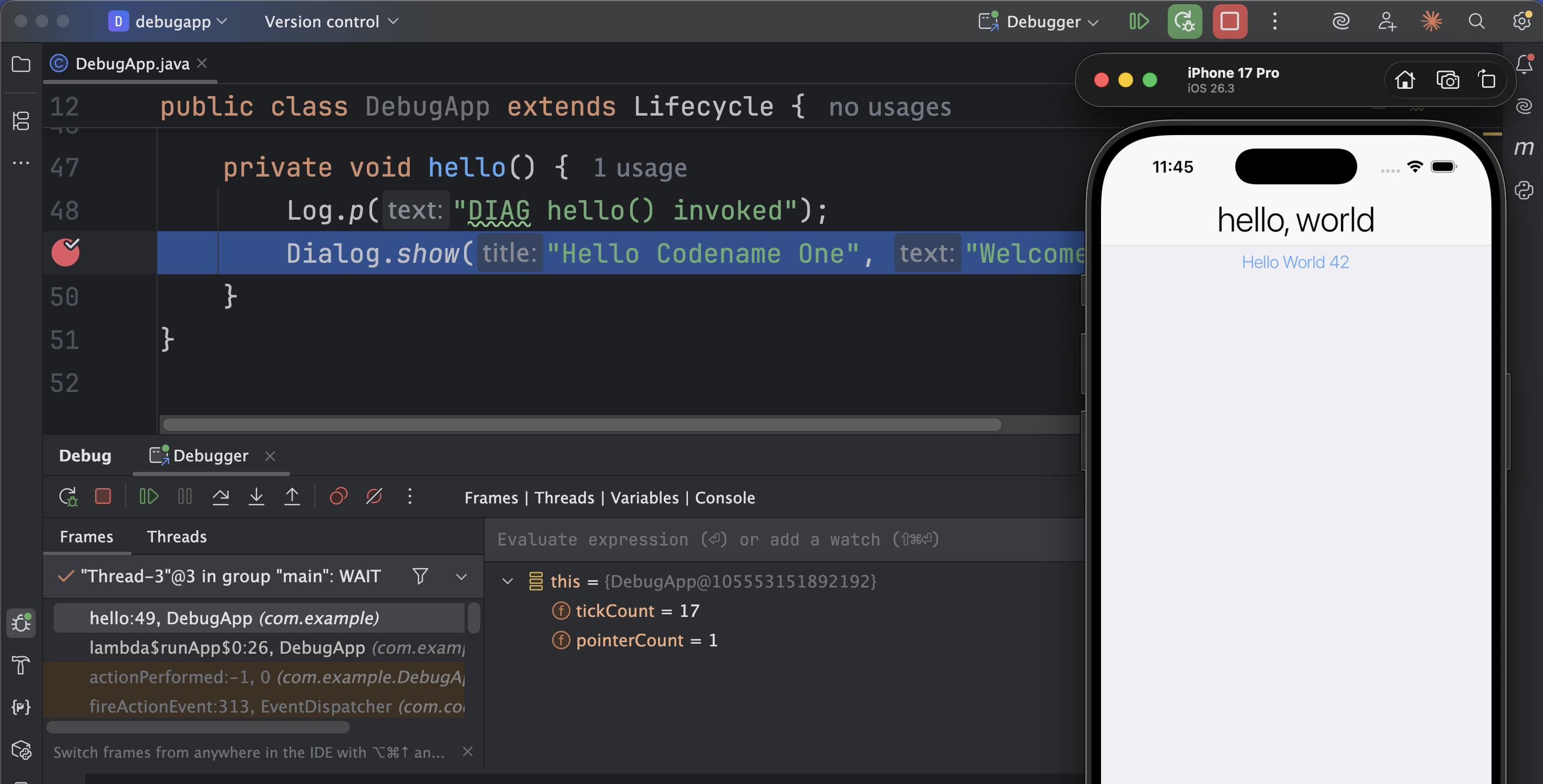 IntelliJ stopped at a breakpoint inside a Codename One iOS app, with locals and the running simulator visible